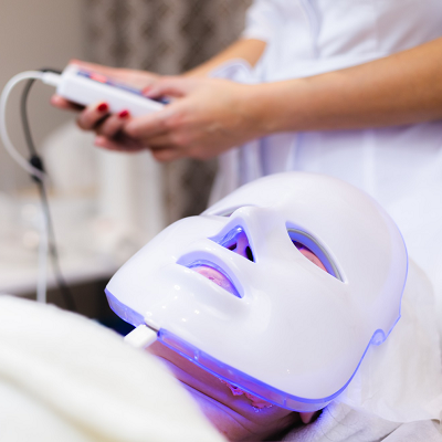 Which light therapy reduces dark circles?